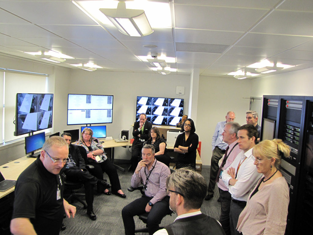 Group gathered in a Hydra control room